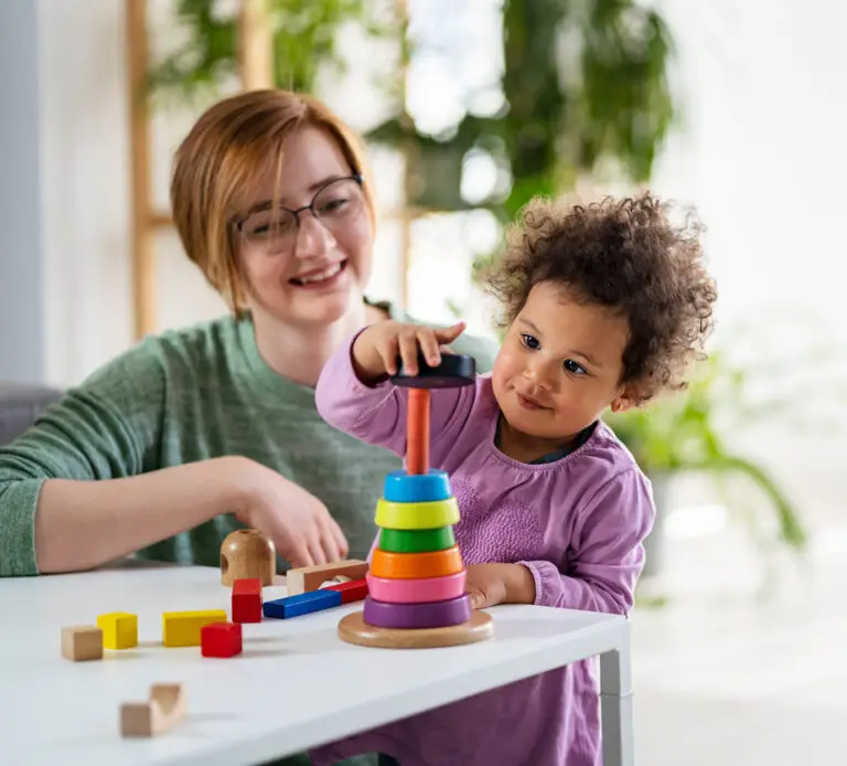 image of a speech therapist providing articulation therapy