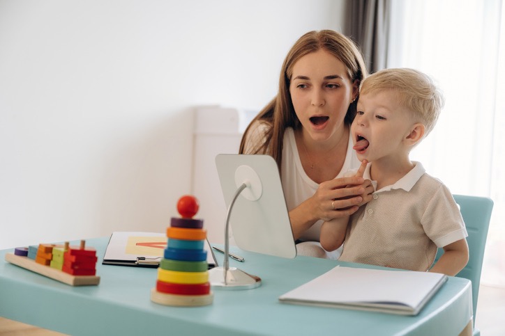 teletherapy speech therapy session with speech-language pathologist and toddler using online video